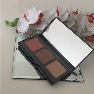 Laura Geller multitasking eye lip cheek palette